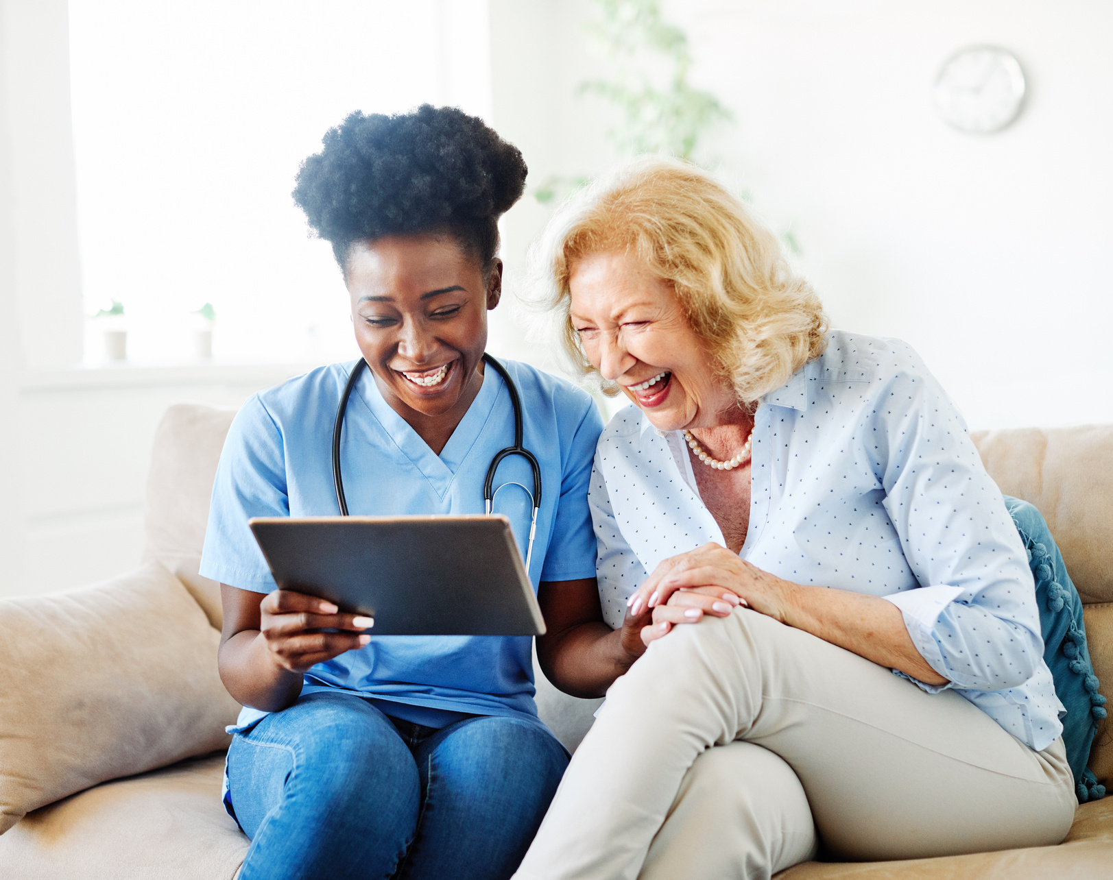Nurse Doctor Senior Care Caregiver Help Tablet Technology Retirement Home Nursing Elderly Woman Health Support African American Black